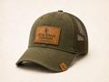 Olive trucker cap with mesh back and embroidered SC crest