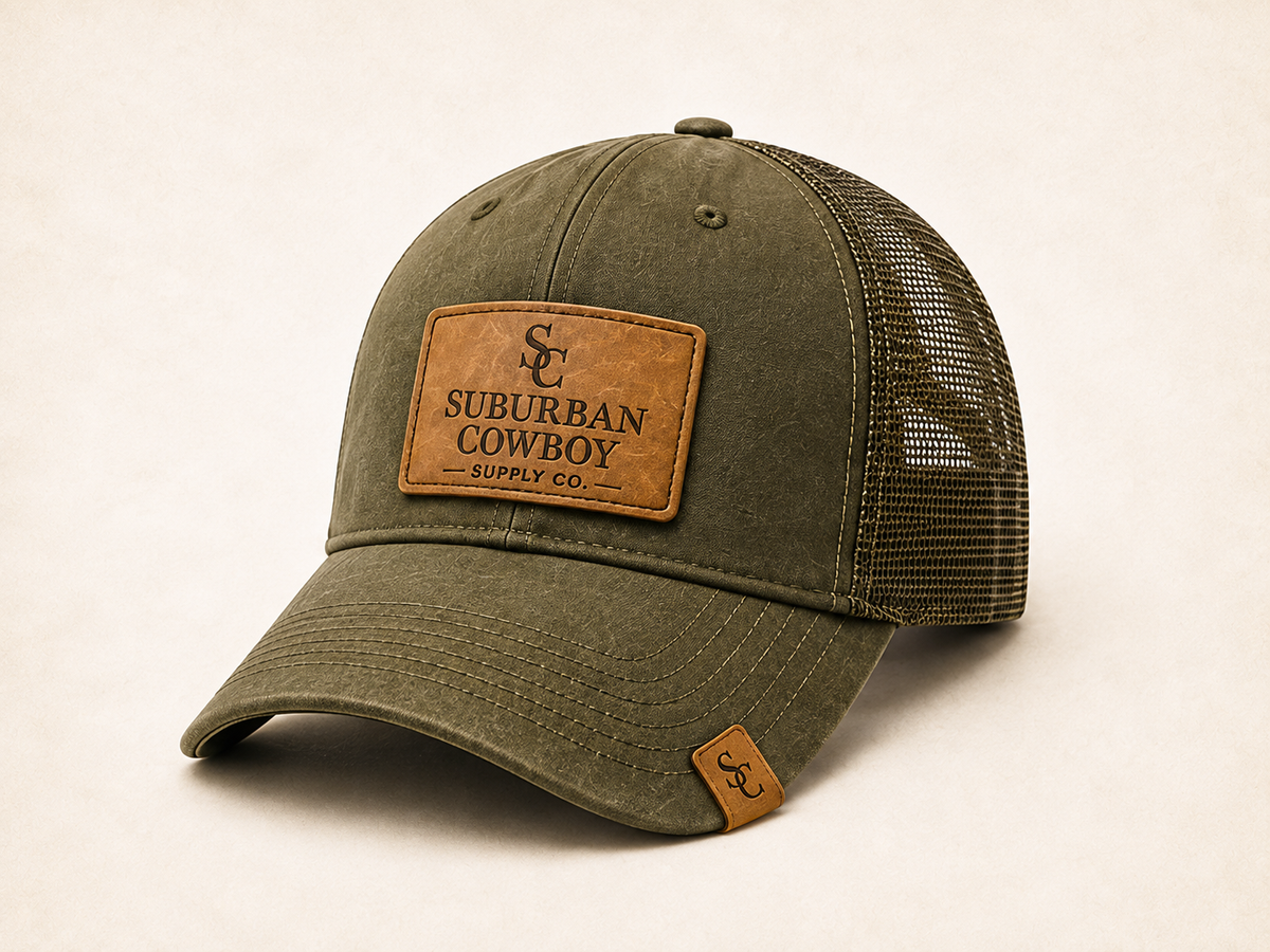 Olive trucker cap with mesh back and embroidered SC crest