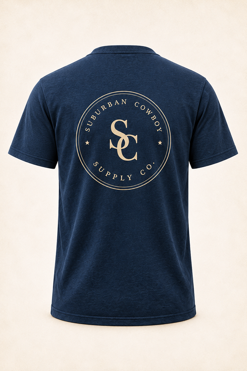 Navy cotton tee with the Suburban Cowboy Supply Co. crest across the back